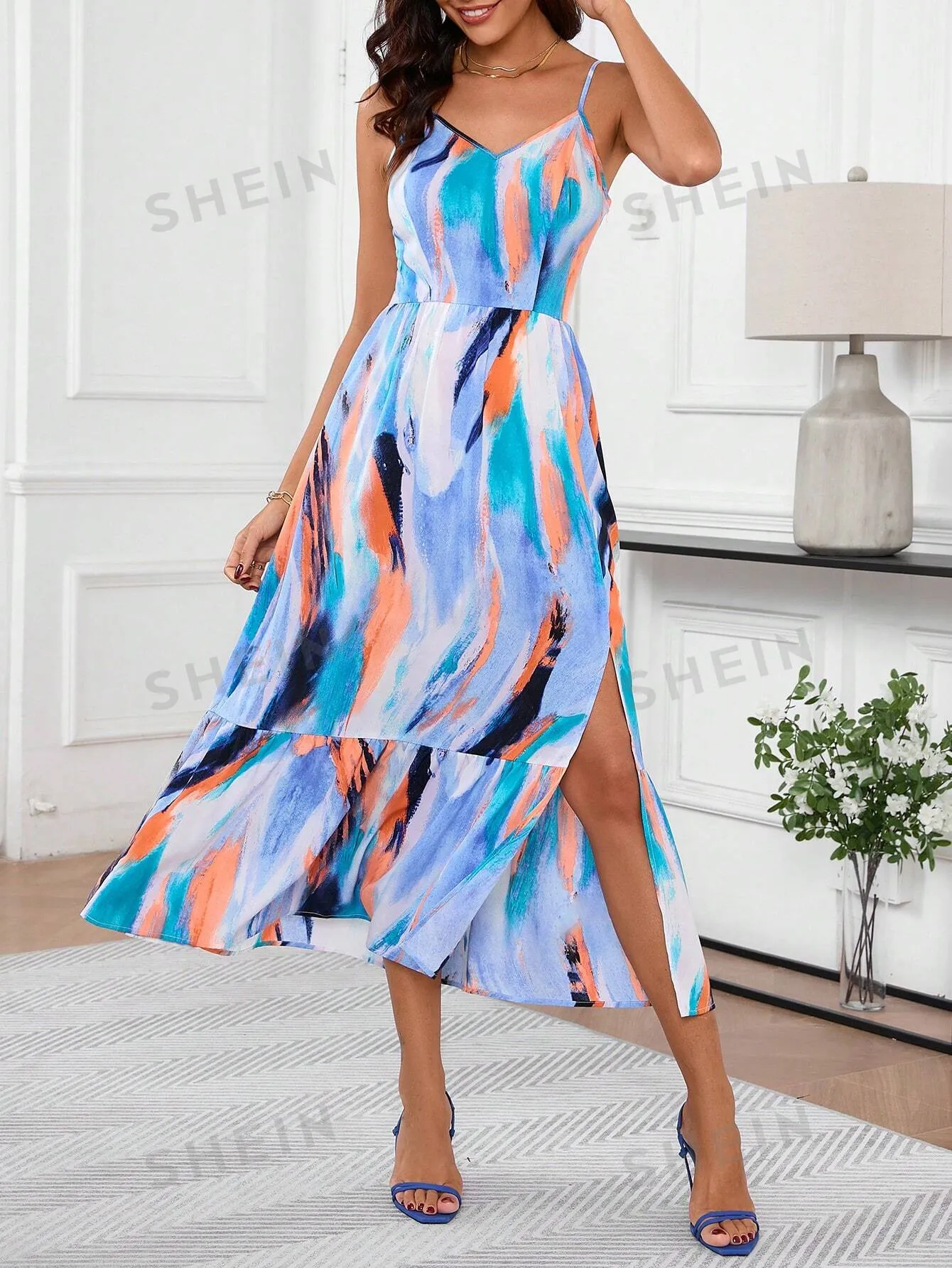 Abstract Elegance: Ruffled Hem Spaghetti Strap Dress